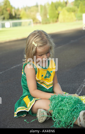 Ragazza vestita come Cheerleader Foto Stock