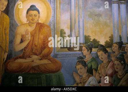 Il Buddha ordinando la madre-in-legge davanti (indossando bianco) con altra femmina converte Foto Stock