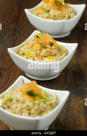 Risotto con paprika, porri e carote Foto Stock