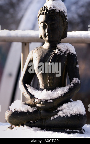 Il Buddha nella neve Foto Stock