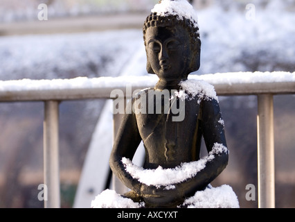 Il Buddha nella neve Foto Stock