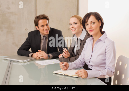 La gente di affari in una riunione Foto Stock