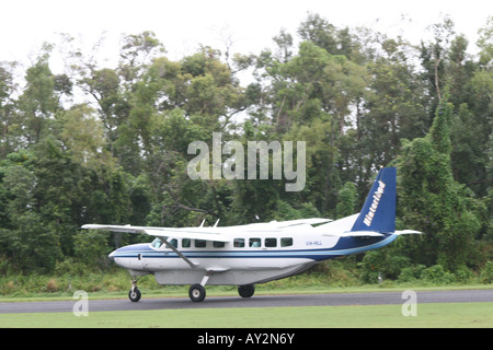 Modello Cessna 208 Caravan - Luce di aeromobili [Dunk Island, opposta Mission Beach, Queensland, Australia, Oceania]. . Foto Stock