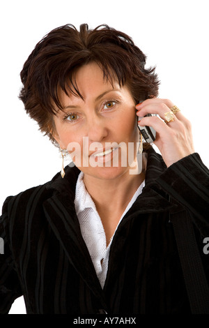 Bianca 50 anno vecchio donna sorridente con il telefono cellulare Foto Stock