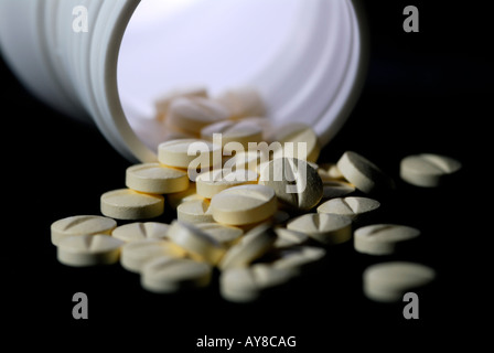 Pillole e contenitore Foto Stock