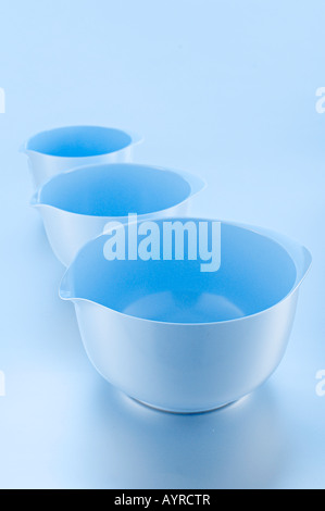 Tre tazze di colore blu Foto Stock