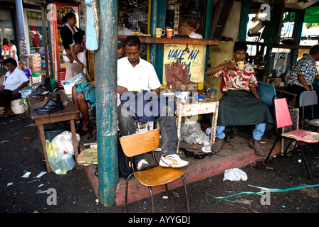 Isole Figi suva riparatori nel mercato Foto Stock