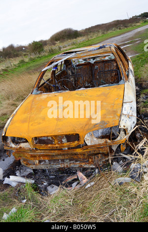 Bruciata auto vicino Ingoldmells, Lincolnshire, Regno Unito Foto Stock