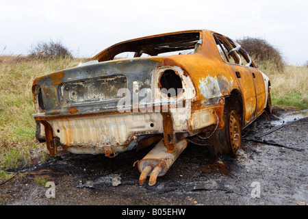 Bruciata auto vicino Ingoldmells, Lincolnshire, Regno Unito Foto Stock