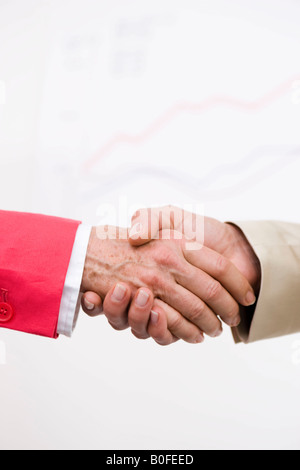L'handshaking close up Foto Stock