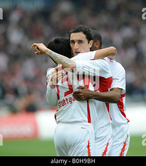 VfB Stuttgart football club giocatori di celebrare un obiettivo, da sinistra a destra: Pavel Pardo, Roberto Hilbert, Cacau e Yildiray Bastuer Foto Stock