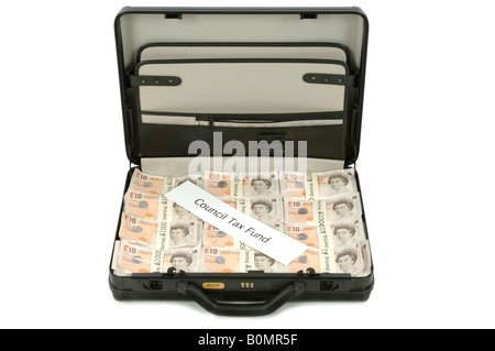 Una valigia piena di soldi con la parola consiglio fondo imposte attraverso di esso Foto Stock