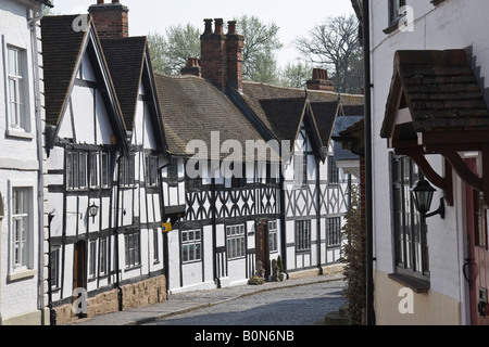 Tipiche case a graticcio in Mill Street, Warwick, Warwickshire, Inghilterra Foto Stock