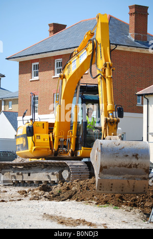 Macchine per il movimento terra sul nuovo alloggiamento dello sviluppo, Poundbury, Dorchester Dorset, England, Regno Unito Foto Stock