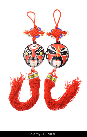 Opera Cinese ornamenti di maschera con nodi mistico Foto Stock