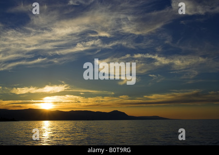 Tramonti Costiera della penisola di Akamas North Western Cipro Foto Stock