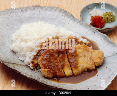 Costoletta di maiale riso al curry Foto Stock