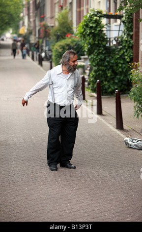 Animatore di strada in Amsterdam. Foto Stock