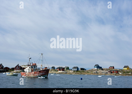 La Groenlandia, ad ovest della Groenlandia, Ilimanaq / Oqaatsut. Il piccolo villaggio di Ilimanaq nella baia di Disko fu fondata dai whalers olandese. Foto Stock