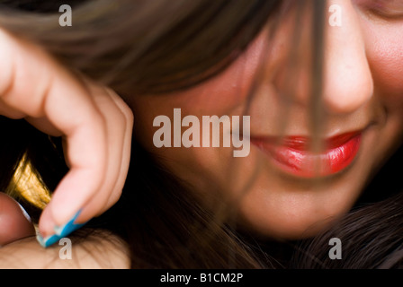 Parte del viso con bocca di una donna rouged Foto Stock