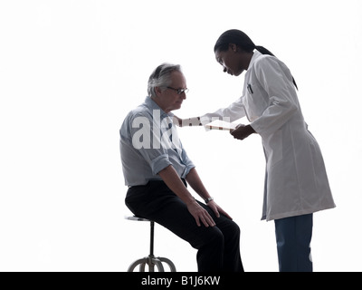 Il medico e il paziente Foto Stock