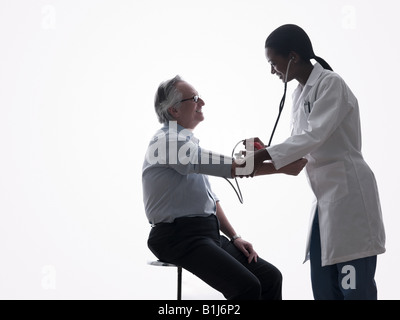 Il medico e il paziente Foto Stock