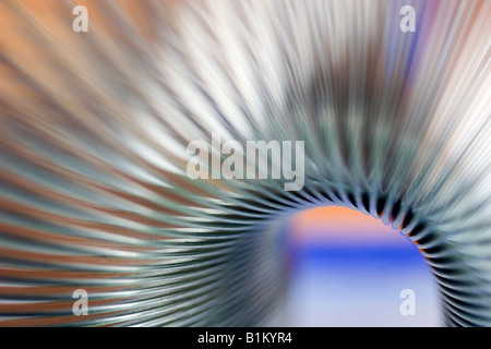 Colorata immagine astratta di un giocattolo Slinky Foto Stock