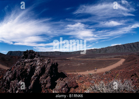 Mountain Biker, Plaines des Sables, Piton de la Fournaise, La Reunion, Francia Foto Stock