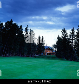 Casa privata al tramonto versante affacciato sul campo da golf, il Fairmont Hot Springs, British Columbia, Canada Foto Stock