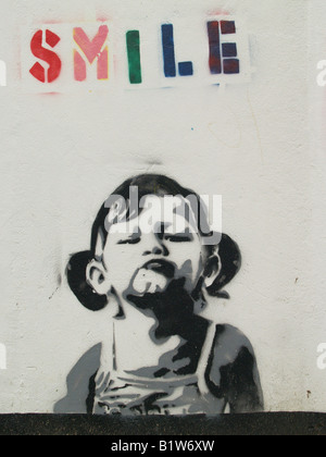 Smile stencil graffiti London REGNO UNITO Foto Stock