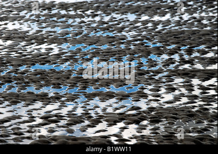 Increspata sabbia e mare spiaggia astratta. Findhorn beach, murene, Scozia Foto Stock