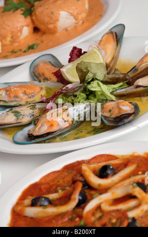 Nuova Zelanda le cozze con Calamari e Funghi ripieni cucina italiana nel ristorante Foto Stock