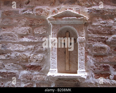 Croce sul lato strada altare a venezia, Italia Foto Stock