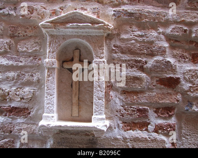 Croce sul lato strada altare a venezia, Italia Foto Stock