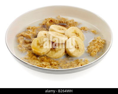 Porridge con banana e sciroppo d'acero Foto Stock