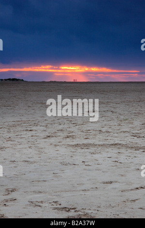 Tramonto a 'pozzetti accanto al mare' Beach, Norfolk, Inghilterra. Foto Stock