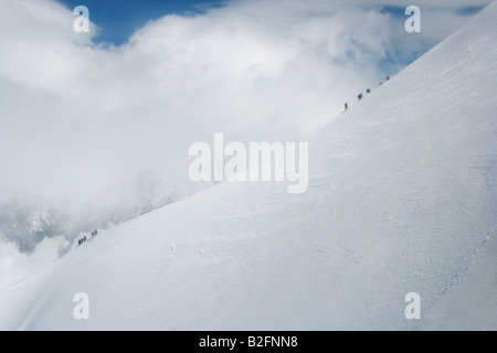 Neve, scalatori, rock, ghiaccioli, Aigulle Du Midi, Chamonix Mont-Blanc, Francia Foto Stock