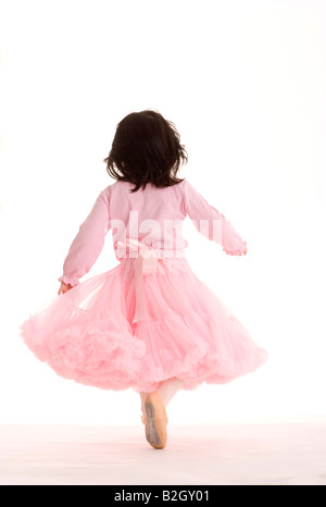 Vista posteriore di una ballerina jumping Foto Stock