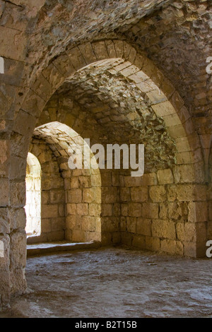 Passaggio arcuato interno Crak Des Chevaliers o Al Hosn Castello dei Crociati in Siria Foto Stock