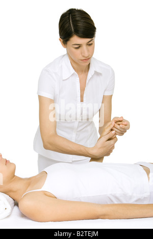 Massaggio Massaggio terapeuta donna di mano Foto Stock