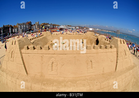 Il primo al mondo mai sand hotel e il più grande castello di sabbia costruito nel Regno Unito, spiaggia di Weymouth Dorset, Gran Bretagna, Regno Unito Foto Stock