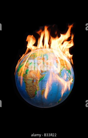 Globo sul fuoco che illustra il riscaldamento globale Foto Stock