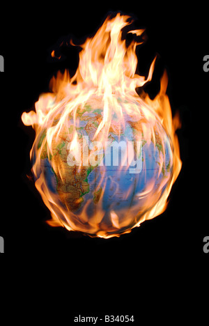 Globo sul fuoco che illustra il riscaldamento globale Foto Stock