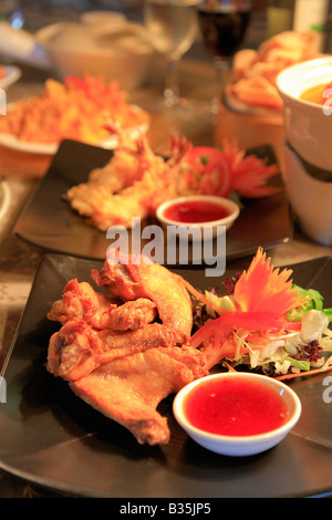 Fritti di ali di pollo Cucina Tailandese in un ristorante impostazione Foto Stock