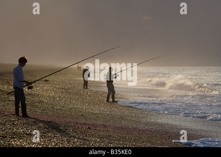 La pesca in mare dalla spiaggia Cley North Norfolk Agosto Foto Stock