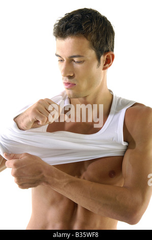 Giovane uomo Giubbotto da indossare Foto Stock