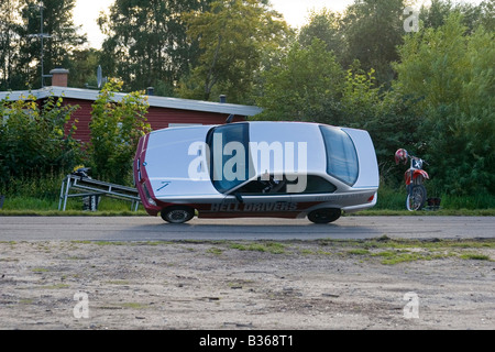 BMW auto su 2 ruote stunt Foto Stock