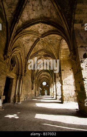 Corridoio con soffitto a volta all'interno di Crak Des Chevaliers o Al Hosn Castello dei Crociati in Siria Foto Stock