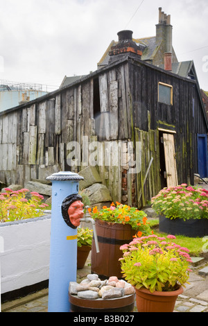 Case e giardini, capannoni in Footdee, St Fittick o Fittie, Aberdeen Scotland, Regno Unito. Fittie piazze, un modello di sistema di alloggiamento costruito per i pescatori in 1809. Foto Stock