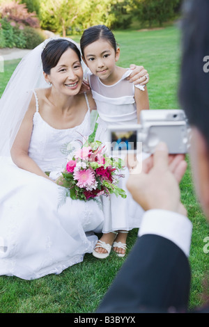 Bride asiatico e fiore ragazza avente fotografia scattata Foto Stock